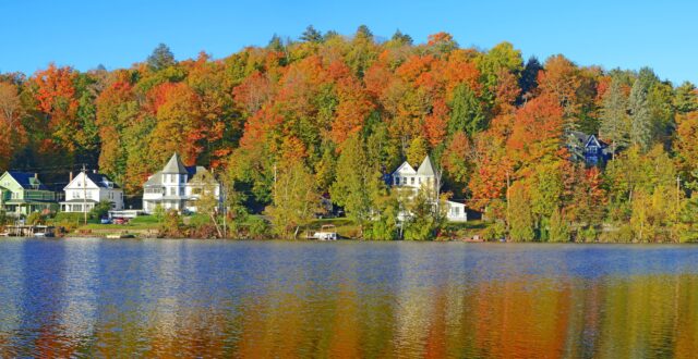 Fall foliage and reflection in Saranac Lake, New York